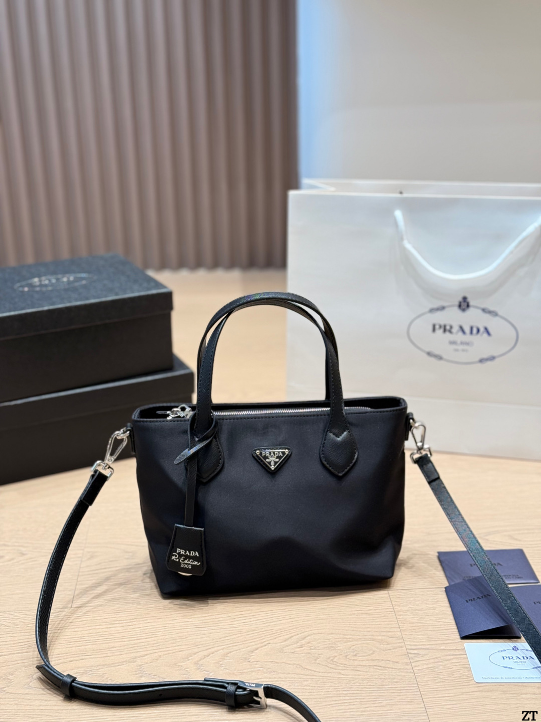 . Prada Nylon Handbag Prada’s classic nylon Handbag is made of iconic parachute - Image 5