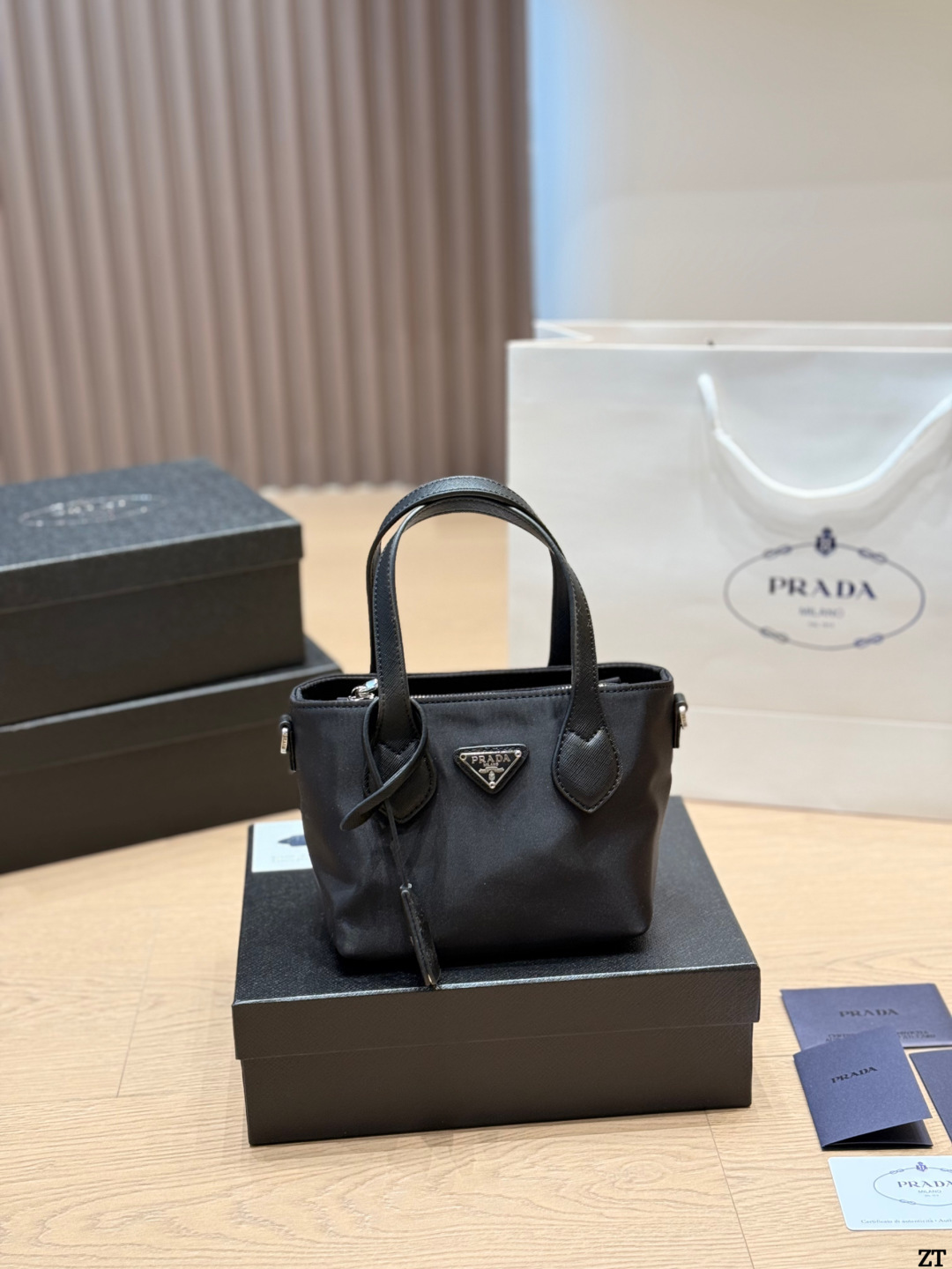 . Prada Nylon Handbag Prada’s classic nylon Handbag is made of iconic parachute - Image 8