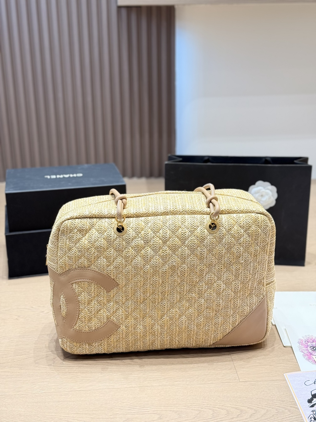 Chanel WovenHandbag Chanel's WovenHandbag is made of light beige Woven material
